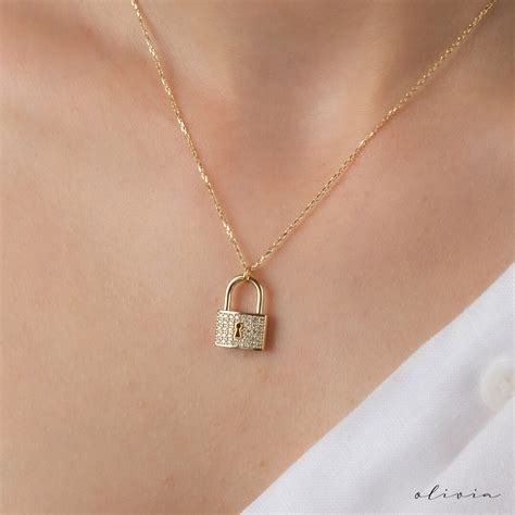 14k gold padlock necklace.